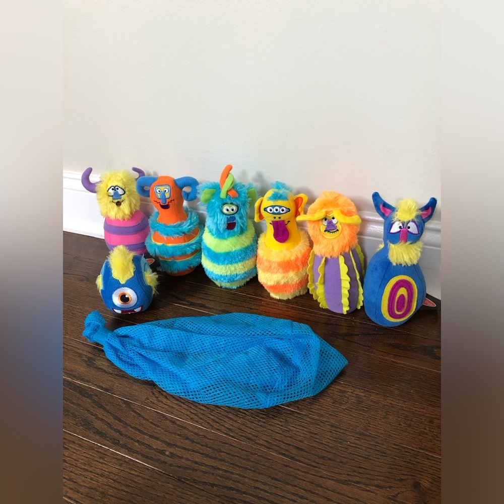 Melissa & Doug 8-Piece Fuzzy Monster Bowling Pin and Ball Set w/Mesh Storage Bag